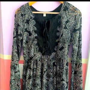 Short gorgeous lace black dress with bell net sleeves and back cut outs